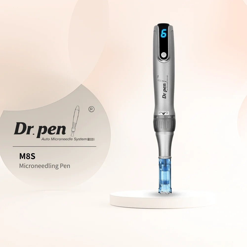 Sleek silver Dr. Pen M8S wireless microneedling pen with blue digital display, on a white pedestal.