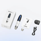Sleek silver and black Dr. Pen Q1S electric beauty device with blue LED display, box, manual, charger, and cartridge.