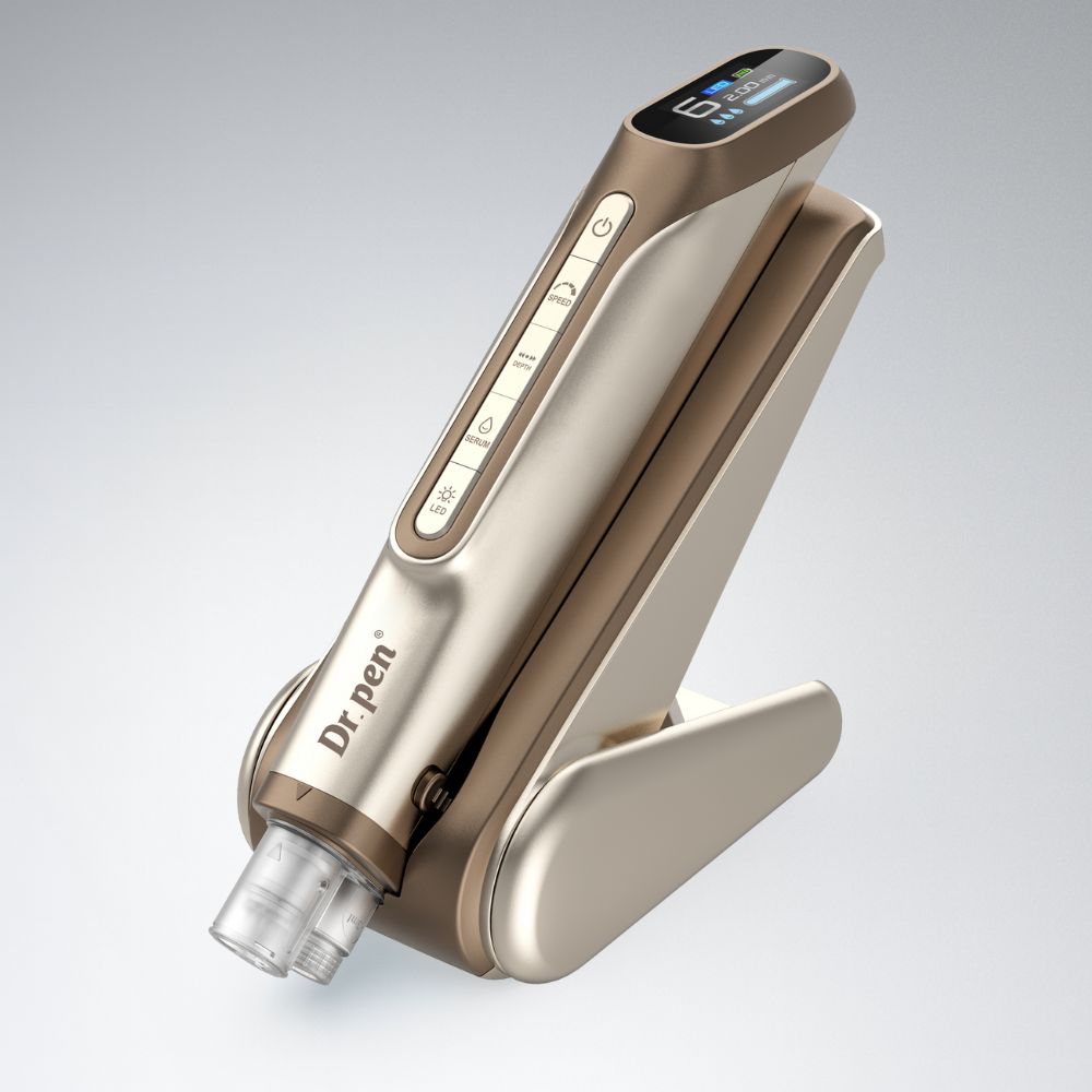 Dr.pen H6 professional microneedling pen in champagne gold with LED display and sleek stand.