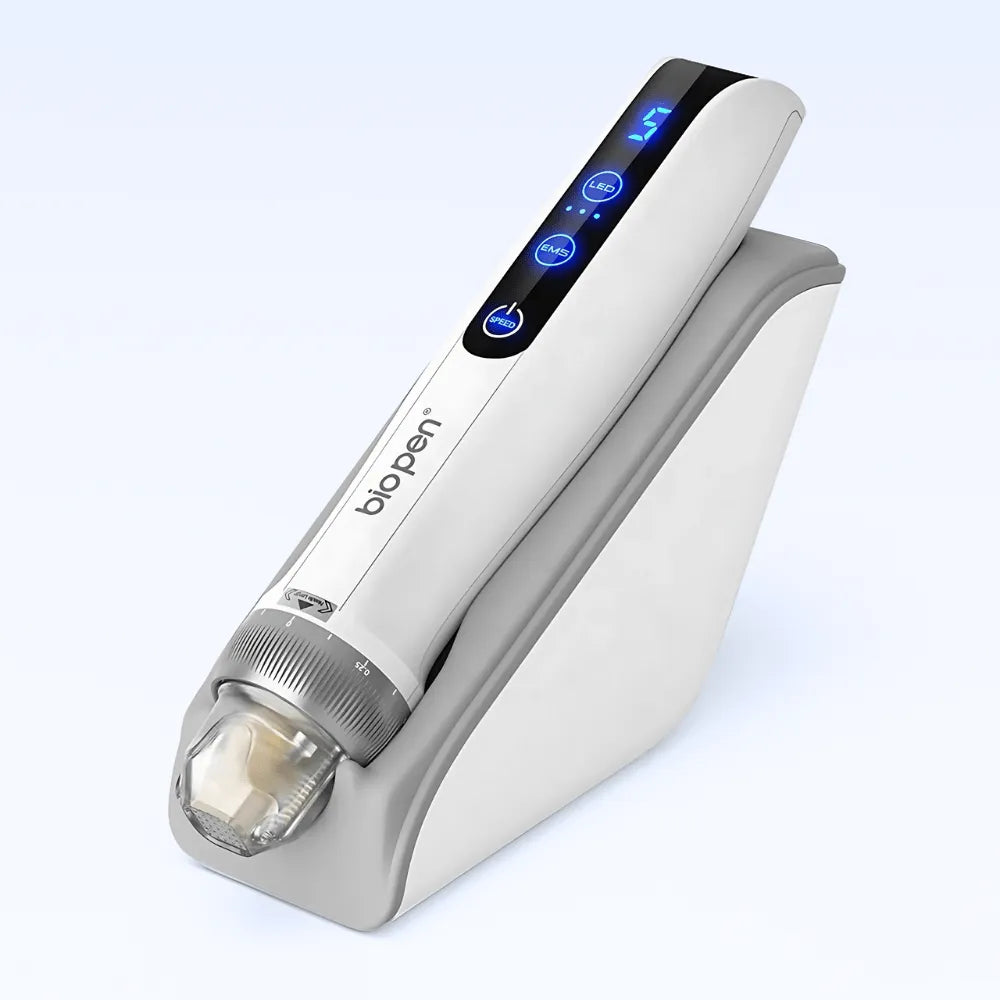 Sleek white Dr.pen Q2 EMS LED Micro Current Pen with a clear cartridge, resting in its modern charging stand.