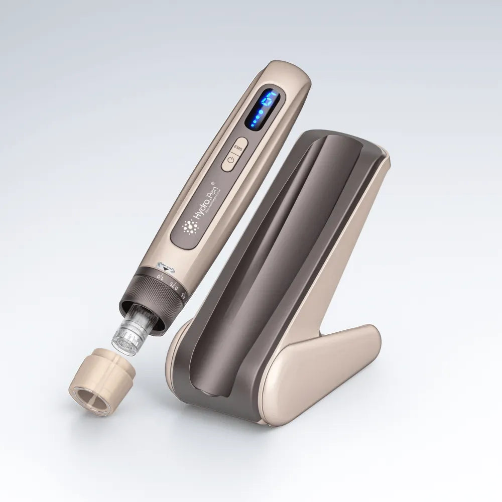 Hydra Pen H5 professional gold micro-needling device with integrated serum container and sleek charging stand.