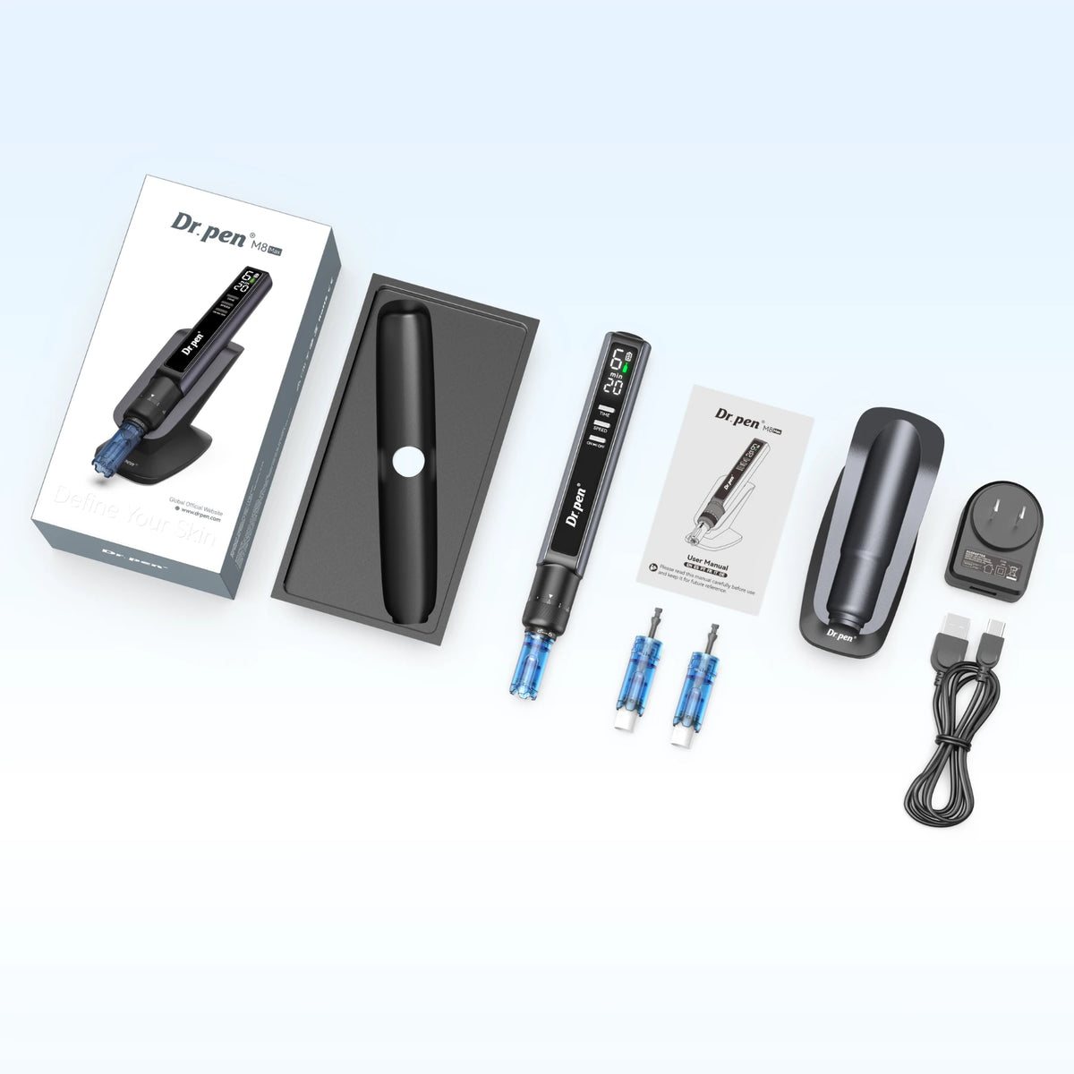 Dr. Pen M8 Max kit showing the pen, stand, spare cartridges, adapter, USB cable, manual and packaging.